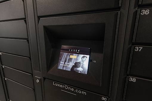 A luxury website is displayed on a screen.