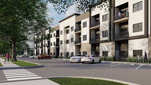 A street view of a residential area with cars and a pedestrian.