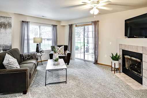 Living Room With TV And Fireplace at Tranquility Pointe, Omaha, NE, 68164