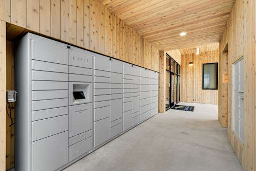 A LUXER branded storage unit in a wooden building.