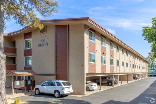 a large building with a car parked in front of it