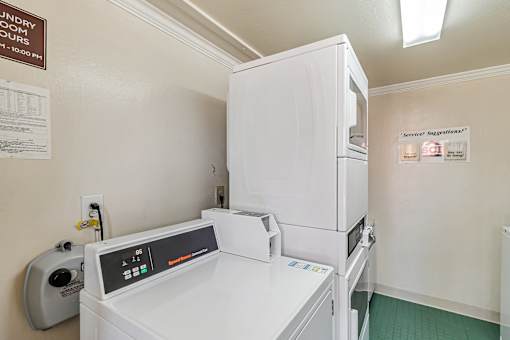 A laundry room with a washing machine
