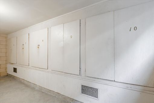 A row of white lockers numbered 7, 8, 9, and 10.