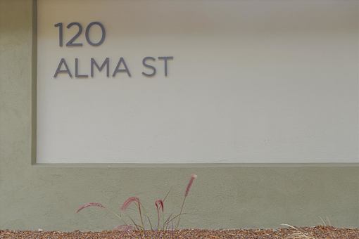 A sign that says 120 Alma St.