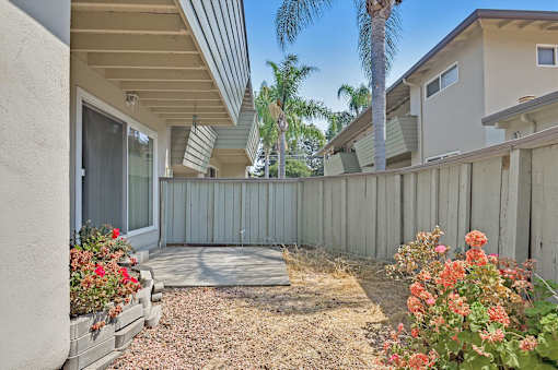 A house with a patio and a fence.