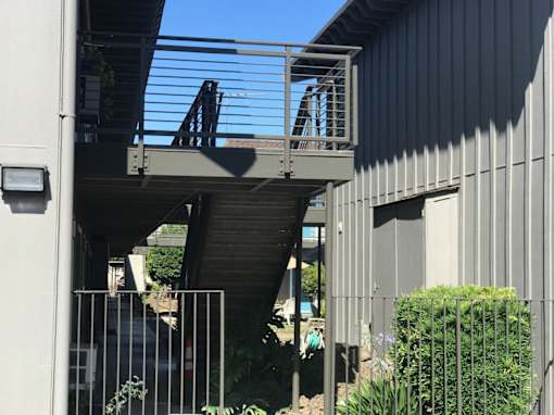 the stairs to the balcony of a house