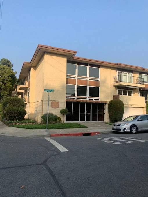 a building with a car parked in front of it
