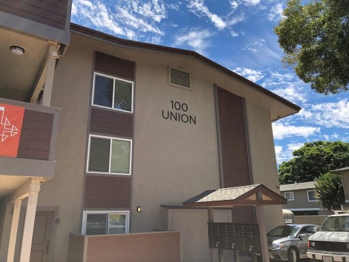 a building with a sign that reads 100 union