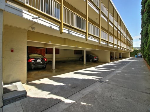 a parking garage with cars parked in it
