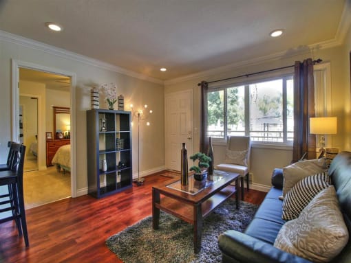 living room with large window at The Arbors at Mountain View, Mountain View, CA