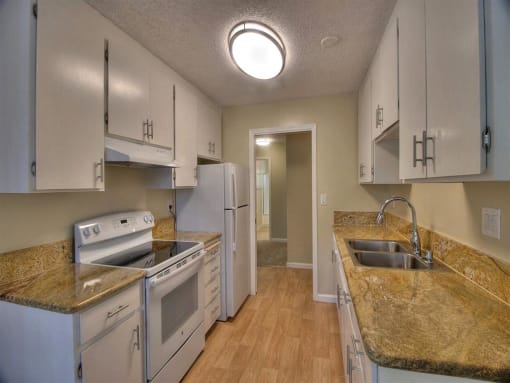 Fully Equipped Kitchen Includes Frost-Free Refrigerator, Electric Range, & Dishwasher at Balboa Apartments, Sunnyvale, 94086