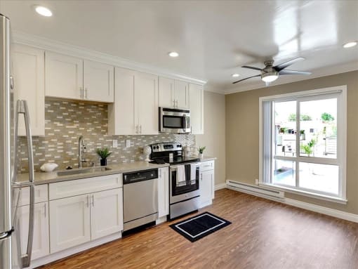 Modern Kitchen With Stainless Steel Appliances And Double Door Refrigerators at Casa Alberta Apartments, Sunnyvale, CA