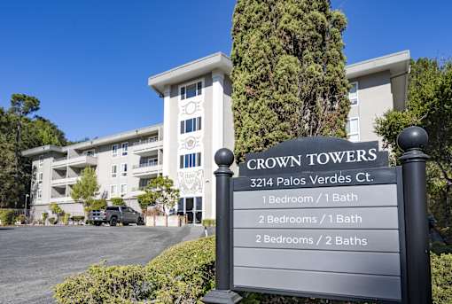 a large building with a sign in front of it