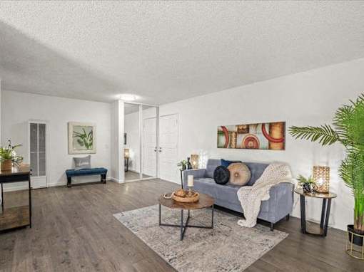 a living room with a couch and a table