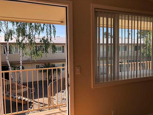 a view of a balcony from a door
