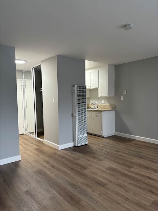 A view of a stairwell leading to a second floor.