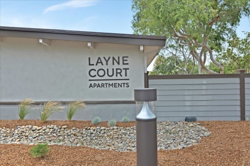 Layne Court sign on building