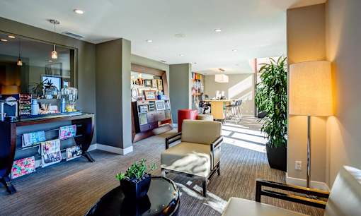 a living room with a couch and a table