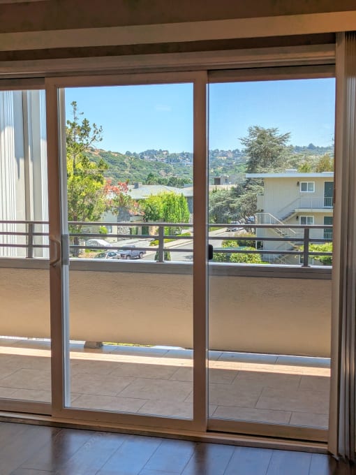 a view of the balcony from the living room