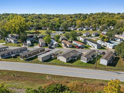 A suburban neighborhood with houses and trees.