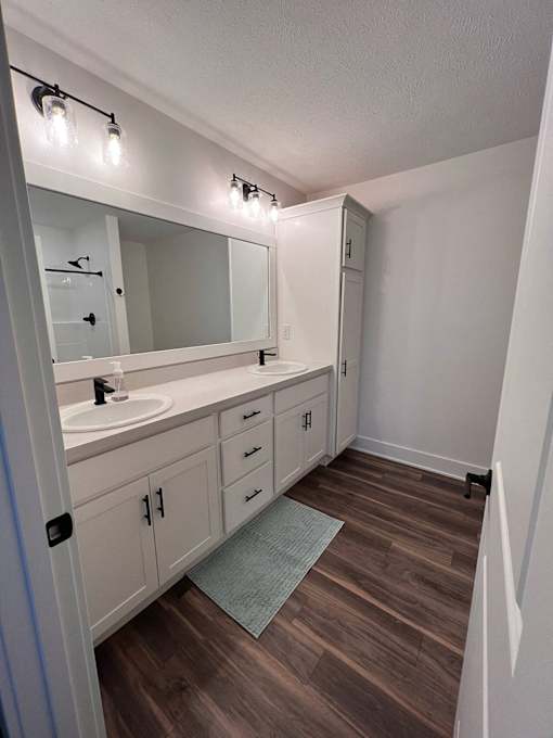 A bathroom with a vanity and a mirror at The Vue at Rivertown Park Townhomes, Wyoming  , Michigan