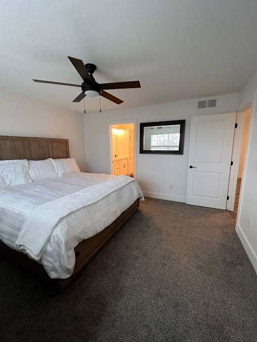 A bedroom with a bed at The Vue at Rivertown Park Townhomes, Wyoming  , MI, 49418
