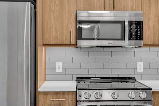 Kitchen with black oven at Altaire at Jackson Park, Washington, 98125
