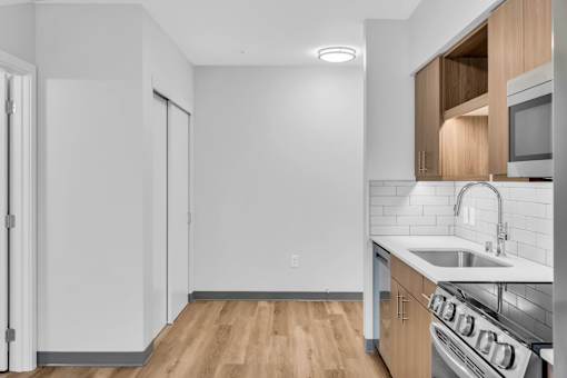 Kitchen with sink and oven at Altaire at Jackson Park, Washington, 98125