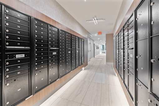 Long Hallway with Black Lockers at Nuovo Apartments, Bellevue, WA