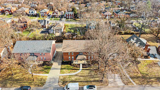A residential area with houses and trees.