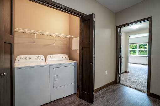 A laundry room with a washer and dryer.