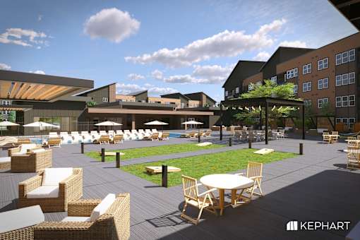 A Kephart branded outdoor seating area with tables and chairs.