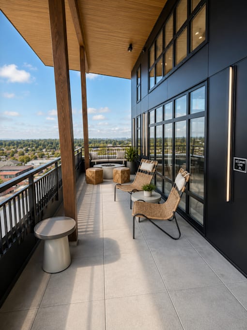 A balcony with a view of the cityscape.