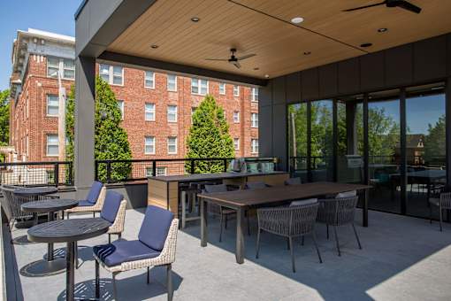 A patio with a table and chairs is shown.