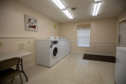 A laundry room with a washer and dryer.