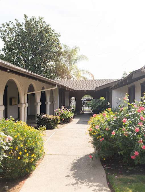 A building with a walkway in front of it.