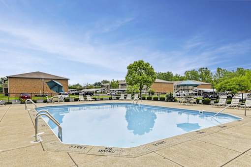 A large swimming pool with a depth marker indicating 3 feet.