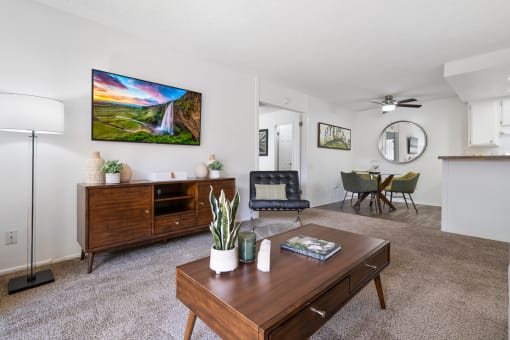 a living room with a couch and a table