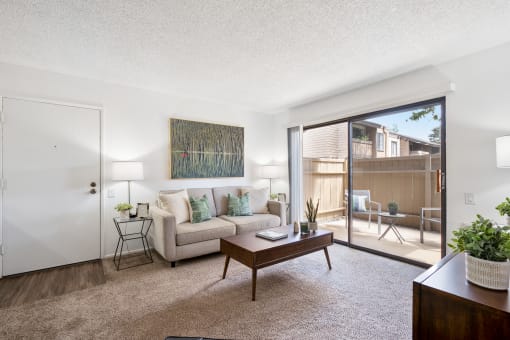 a living room with a couch and a coffee table