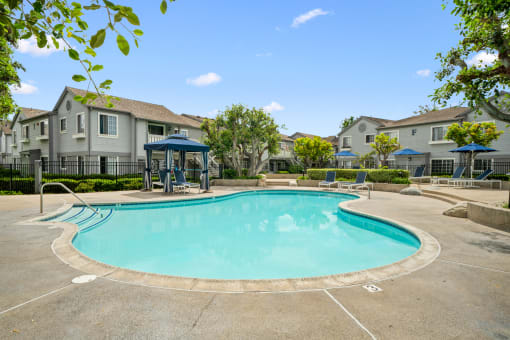 the preserve at ballantyne commons pool with apartment buildings