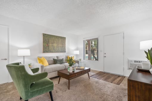 a living room with a couch and a chair