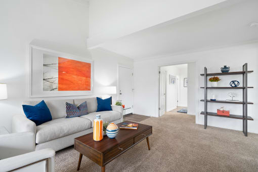 a living room with a couch and a coffee table