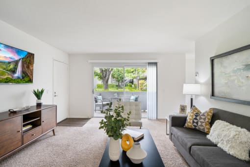 a living room with a couch and a coffee table