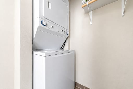 A white dishwasher is installed in a kitchen.