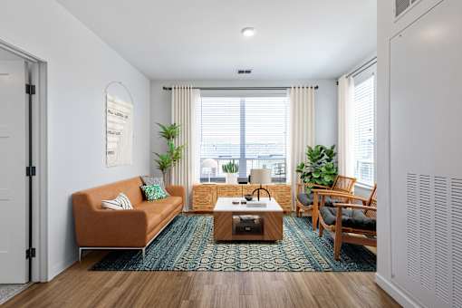 a living room with a couch and a table