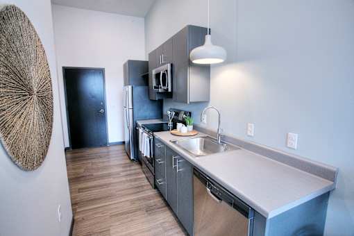 Modern kitchen with appliances at The Traveler Apartments, Nebraska, 68131