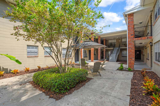 the courtyard at the whispering winds apartments in pearland, tx