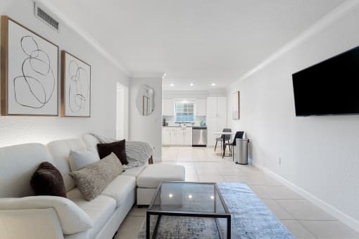 a living room with a couch and a coffee table