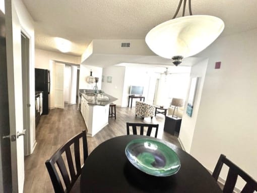 a dining room table with a bowl on top of it