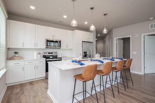 Kitchen with Island at The Residences at Enso, Florida